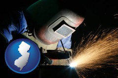 nj map icon and a welder using welding equipment