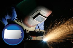 pa map icon and a welder using welding equipment