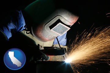 a welder using welding equipment - with California icon