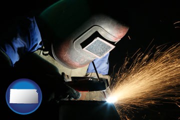 a welder using welding equipment - with Kansas icon