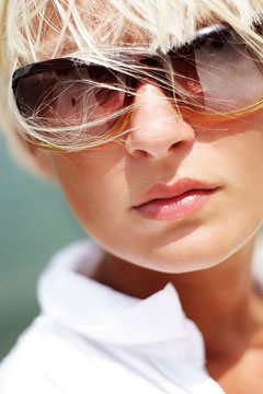 a young woman wearing sunglasses
