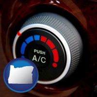 oregon map icon and an automobile air conditioner control knob
