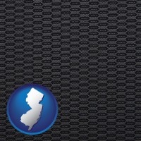 new-jersey map icon and a gray car upholstery sample