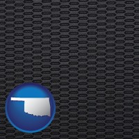 oklahoma map icon and a gray car upholstery sample