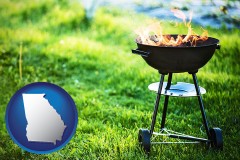 georgia map icon and a round barbecue grill