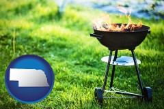 nebraska map icon and a round barbecue grill