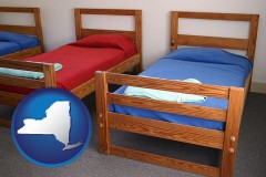 new-york map icon and summer camp beds