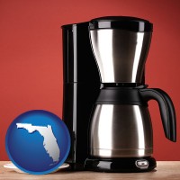 florida map icon and a coffeemaker with a coffee cup and saucer