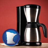 minnesota map icon and a coffeemaker with a coffee cup and saucer