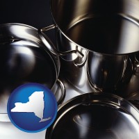 new-york map icon and stainless steel cookware