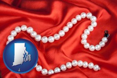 rhode-island map icon and a faux pearl necklace