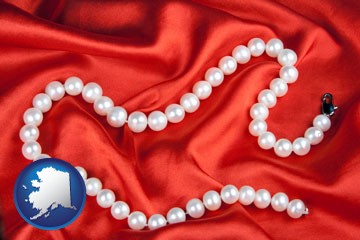 a faux pearl necklace - with Alaska icon