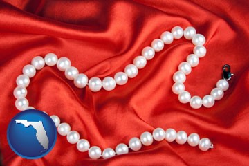 a faux pearl necklace - with Florida icon