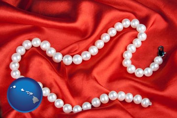 a faux pearl necklace - with Hawaii icon