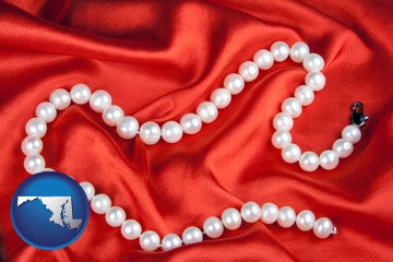 a faux pearl necklace - with Maryland icon