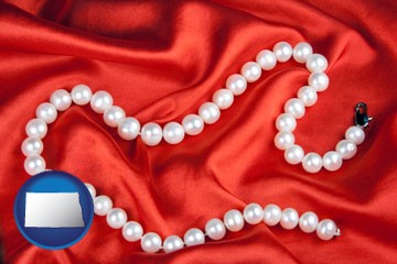 a faux pearl necklace - with North Dakota icon