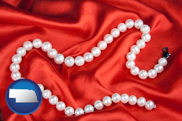 a faux pearl necklace - with Nebraska icon