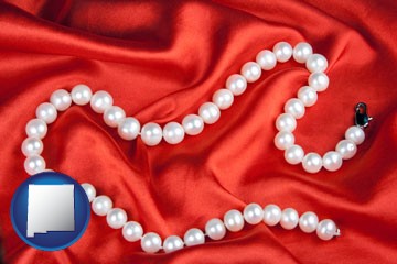 a faux pearl necklace - with New Mexico icon