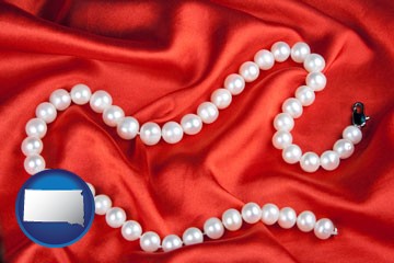 a faux pearl necklace - with South Dakota icon