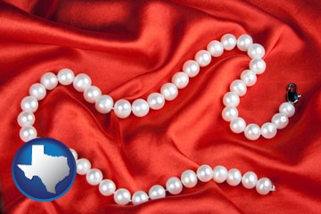 a faux pearl necklace - with Texas icon