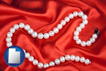 a faux pearl necklace - with Utah icon