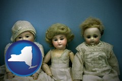new-york map icon and antique dolls