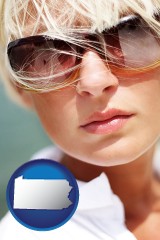 pennsylvania map icon and a young woman wearing sunglasses