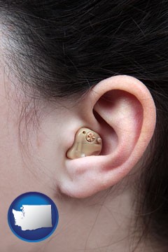 a woman wearing a hearing aid in her left ear - with Washington icon