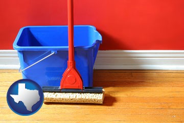 a bucket and mop on a hardwood floor - with Texas icon