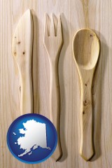 alaska map icon and a wooden knife, fork, and spoon