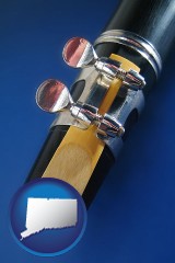 connecticut map icon and a clarinet reed