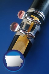 iowa map icon and a clarinet reed