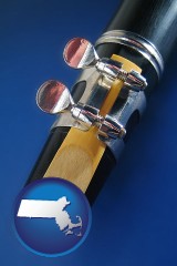 massachusetts map icon and a clarinet reed