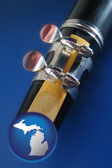 michigan map icon and a clarinet reed