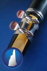 new-hampshire map icon and a clarinet reed