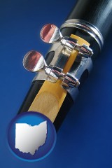 ohio map icon and a clarinet reed