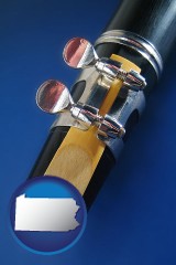 pennsylvania map icon and a clarinet reed