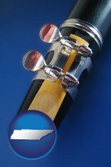 tennessee map icon and a clarinet reed