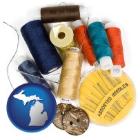 michigan map icon and a sewing kit