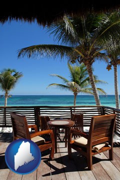 outdoor furniture on a tropical, oceanfront deck - with Maine icon