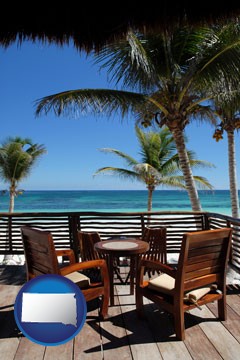 outdoor furniture on a tropical, oceanfront deck - with South Dakota icon