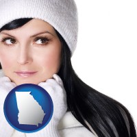georgia map icon and a woman wearing warm, white outerwear