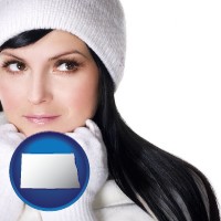 north-dakota map icon and a woman wearing warm, white outerwear