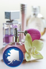 alaska map icon and a perfume bottle, with atomizer, and an orchid flower