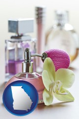 georgia map icon and a perfume bottle, with atomizer, and an orchid flower