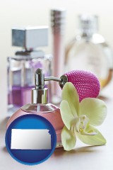 kansas map icon and a perfume bottle, with atomizer, and an orchid flower