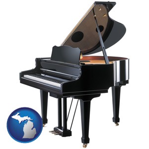 a grand piano - with Michigan icon