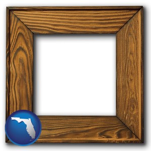 a wooden picture frame - with Florida icon