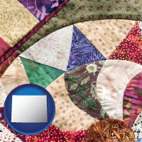 wyoming map icon and a patchwork quilt