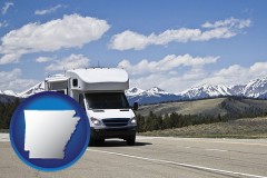 arkansas map icon and recreational vehicle and snow-capped mountains